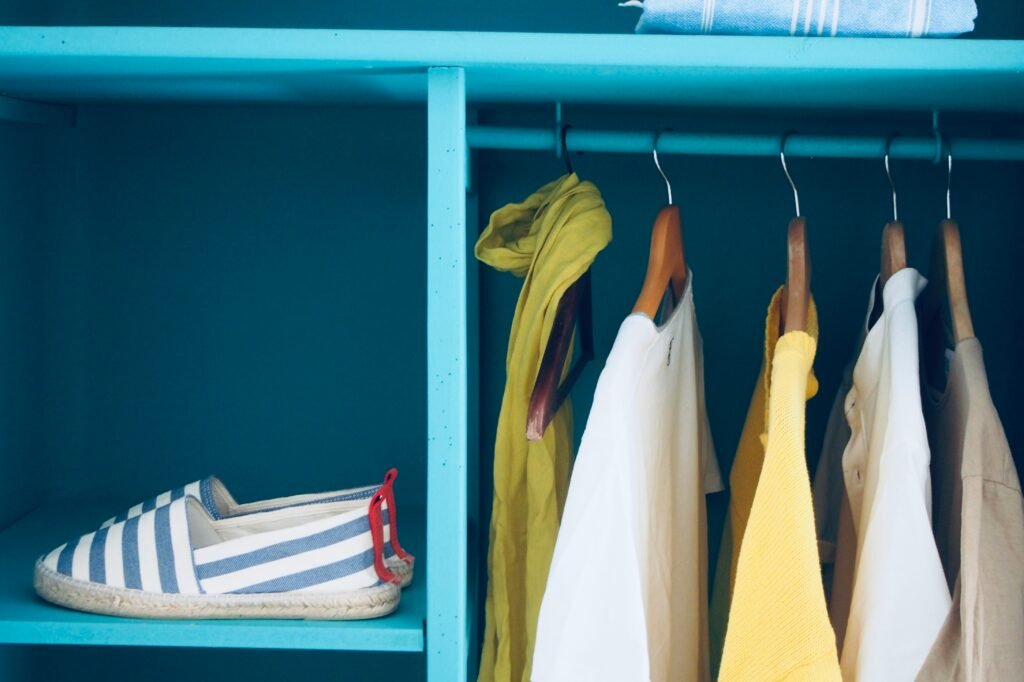 hangers on plastic rod and shoe shelf