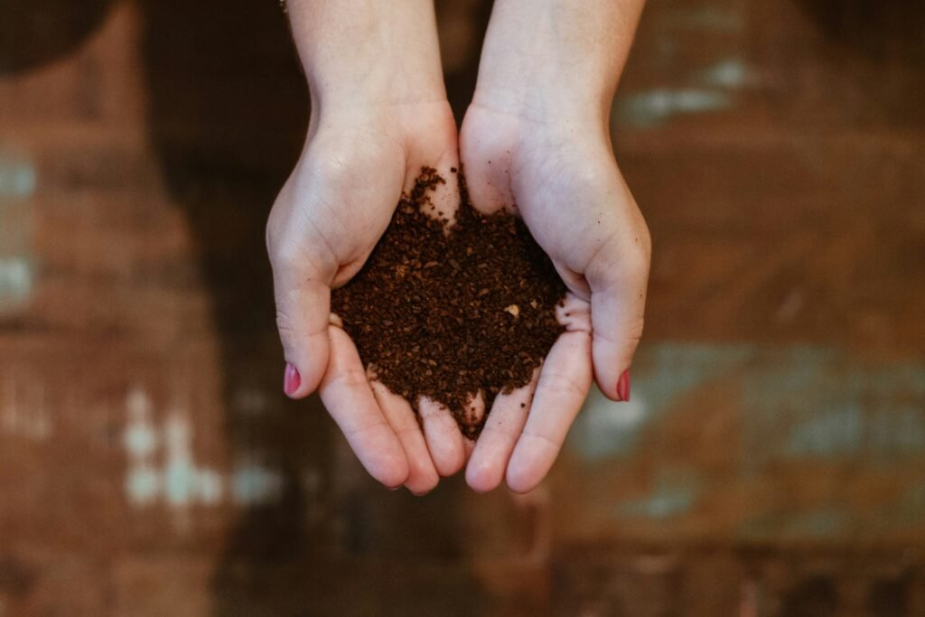 ready-to-use compost in cupped hands